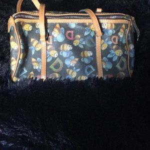 Bee print Dooney & Bourke shoulder bag.